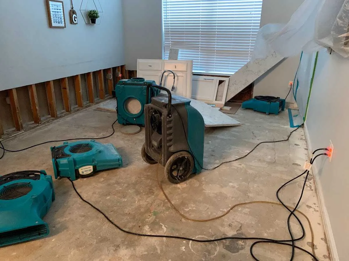 Dehumidifier in flood-cut room for Water Damage Restoration in Wayland
